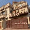 Spacious 5-bedroom house for sale in Chakwal, featuring a large garden and modern design